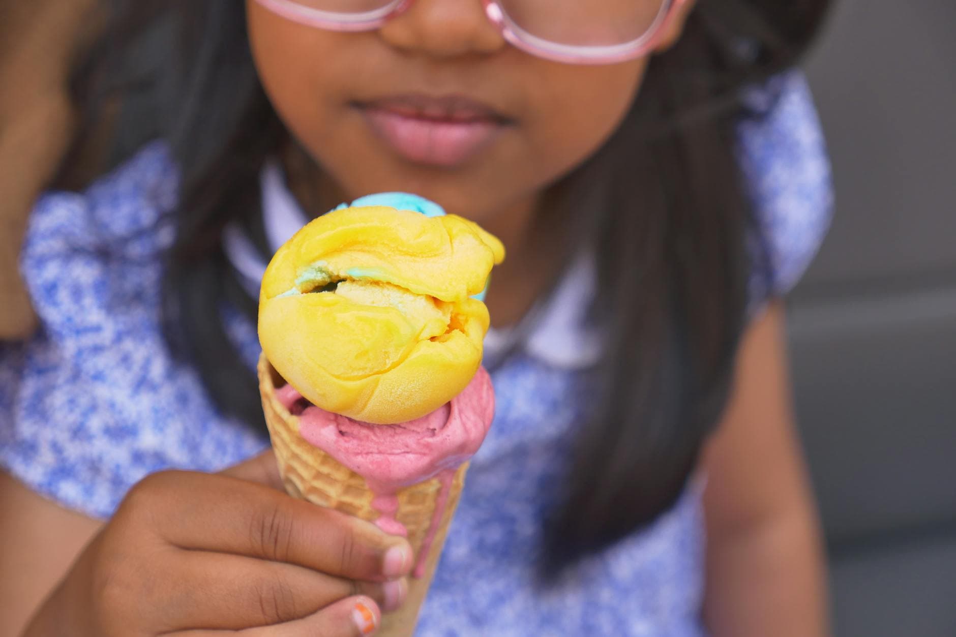 Colorful ice cream scoops in a cone